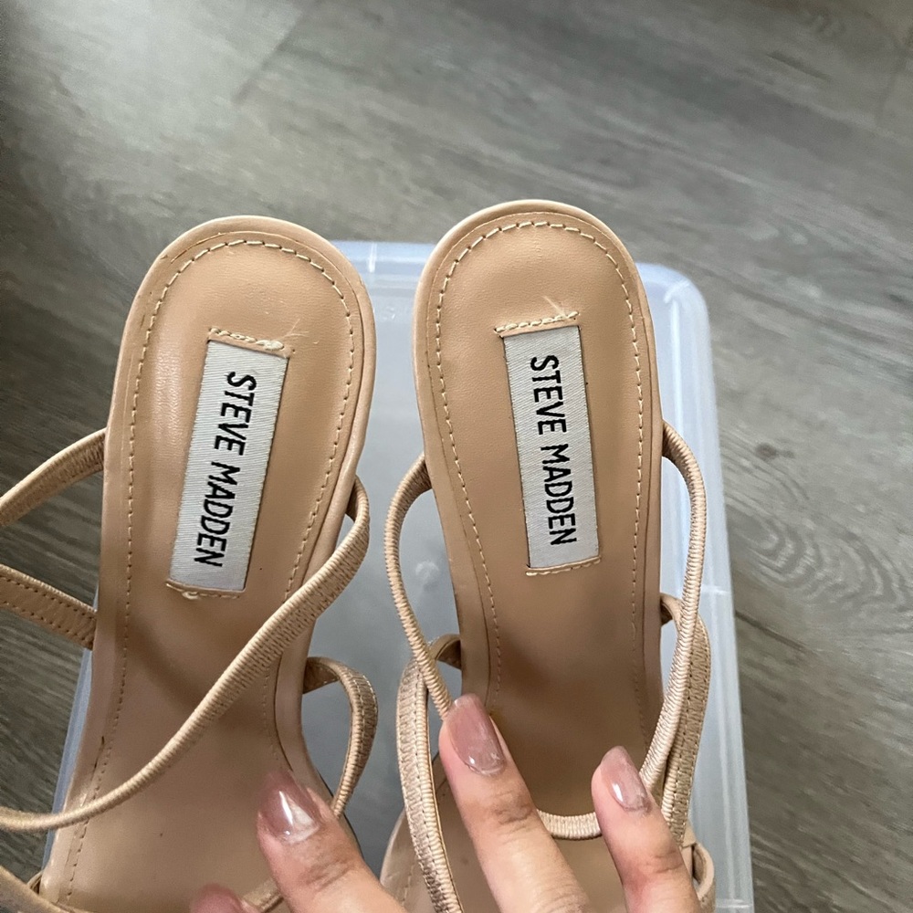 Cream Steve Madden sandals with a 4 inch heel